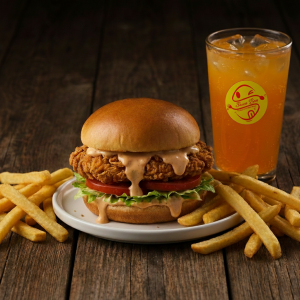 Patty Burger Meal with juicy chicken burger, crispy fries, and a chilled drink - Sauce Boss
